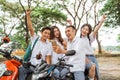 Happy high school student selfie using smartphone celebrating graduation