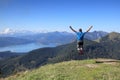 Happy hiker is jumping in nature