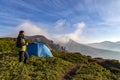 Happy hiker on the mountain top