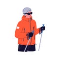 Happy hiker with trekking poles. Tourist hiking and climbing with sticks in hands. Traveler walking in winter equipment