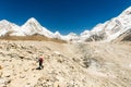 Happy hiker walking in the mountains. Himalayas, Everest Base Camp trek, Nepal