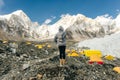 Happy hiker walking in the mountains. Himalayas, Everest Base Camp trek, Nepal
