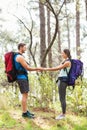 Happy hikers holding hands Royalty Free Stock Photo