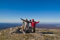 Happy hikers on mount summit