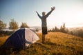 Happy hiking travel on top of mountain hand up looking to sunrise. travel concept Royalty Free Stock Photo