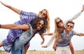 Happy hippie friends having fun on cereal field Royalty Free Stock Photo