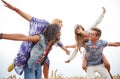 Happy hippie friends having fun on cereal field Royalty Free Stock Photo