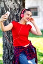 Happy hipster beautiful girl listening to music Royalty Free Stock Photo