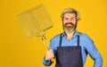 Happy hipster hold cooking utensils for barbecue. bearded man chef. Tools for roasting meat outdoors. Picnic and