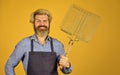 happy hipster hold cooking utensils for barbecue. bearded man chef. Tools for roasting meat outdoors. Picnic and Royalty Free Stock Photo
