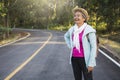 Happy hipster old women backpack traveling on the road relax time and holiday Royalty Free Stock Photo