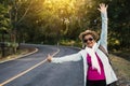 Happy hipster old women backpack traveling on the road relax time and holiday Royalty Free Stock Photo