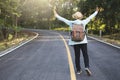 Happy hipster old women backpack traveling on the road relax time and holiday Royalty Free Stock Photo