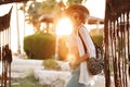 Happy hipster woman having fun on vacation in hat and sunglasses. Sunny lifestyle fashion girl Royalty Free Stock Photo