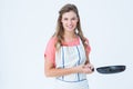 Happy hipster woman holding frying pan Royalty Free Stock Photo