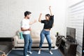 Smiling Latin Couple Dancing At Home Royalty Free Stock Photo