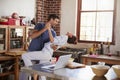 Happy Hispanic couple dancing in kitchen in the morning Royalty Free Stock Photo