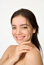 Happy Hispanic girl with freckles on face isolated on white. Vertical portrait. Royalty Free Stock Photo