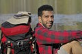 Happy Hispanic Man with Backpack Royalty Free Stock Photo