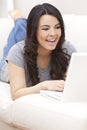 Happy Hispanic Woman Using Laptop Computer Royalty Free Stock Photo