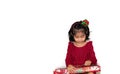 Happy holidays! Cute little child opening gift at Christmas Royalty Free Stock Photo