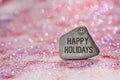 Happy holidays engrave on stone Royalty Free Stock Photo