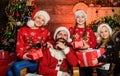 Happy holidays. Father bearded man and mother with cute daughters christmas tree background. Spend time with your family Royalty Free Stock Photo