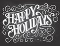 Happy holidays hand-lettering on chalkboard background