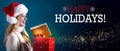 Happy holidays message with woman opening a gift box Royalty Free Stock Photo