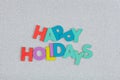Happy Holidays text creatively arranged.