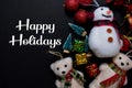 Happy Holidays text isolated on black backgroud. Frame of Christmas Decoration Royalty Free Stock Photo