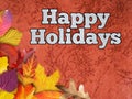 Happy Holidays Typography Text Greeting Card With flower And Leaves On Background.