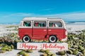 Happy Holidays VW bus sign on New Smyrna Beach, Florida Royalty Free Stock Photo