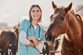 Happy horse doctor, portrait and woman at farm with arms crossed, care or smile for love, animal or nature. Vet, nurse Royalty Free Stock Photo