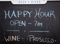 Happy hour sign in St John Royalty Free Stock Photo