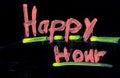 Happy hour written on black chalkboard with chalk Royalty Free Stock Photo
