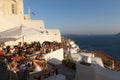 Happy hours on a terrace overlooking the sea