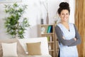 happy housekeeper smiling at camera Royalty Free Stock Photo