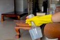 Happy housewives in rubber gloves with dust-wiping equipment, aerosol cleaners ready cleaning. concept do housework Royalty Free Stock Photo