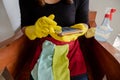 Happy housewives in rubber gloves with dust-wiping equipment, aerosol cleaners ready cleaning. concept do housework Royalty Free Stock Photo