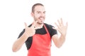 Happy hypermarket seller showing eight fingers Royalty Free Stock Photo