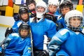 Happy ice hockey team with goaltender after game