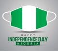 Happy independence day Nigeria. Nigerian flag with medical mask, use for printing. cvid19, corona virus concept