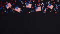 Happy Independence Day USA banner template. Frame border of blue red white confetti and American flags on dark background. 4th of Royalty Free Stock Photo