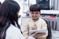 Happy Indian child boy wearing spectacles in glasses shop. Patient kid male checkup iris examines ophthalmological clinic of