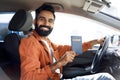 Happy Indian Driver Man Showing His Passport Sitting Inside Automobile