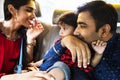 A happy Indian family sitting in car Royalty Free Stock Photo