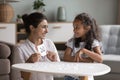 Happy Indian mom helping kid to study math Royalty Free Stock Photo