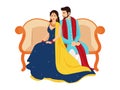 Happy Indian Wedding Couple Character Sit on Sofa in Traditional Royalty Free Stock Photo