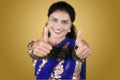 Happy Indian woman showing two thumbs up Royalty Free Stock Photo